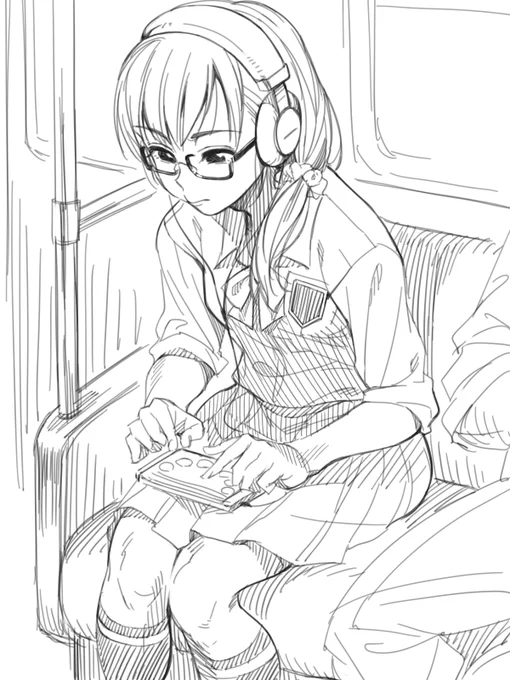 今日電車でみた熱心にスクフェスをやるJK 