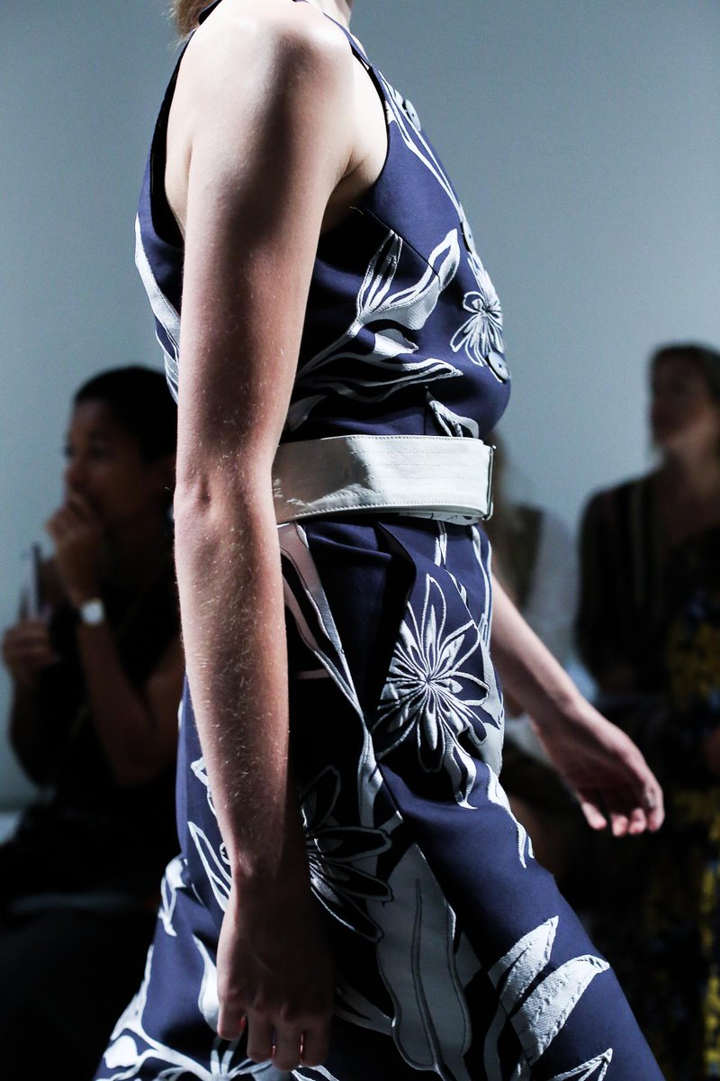 nyfw's tweet photo. On the runway at @suno: Belts and blues. #NYFW http://t.co/JGaHVli9PE