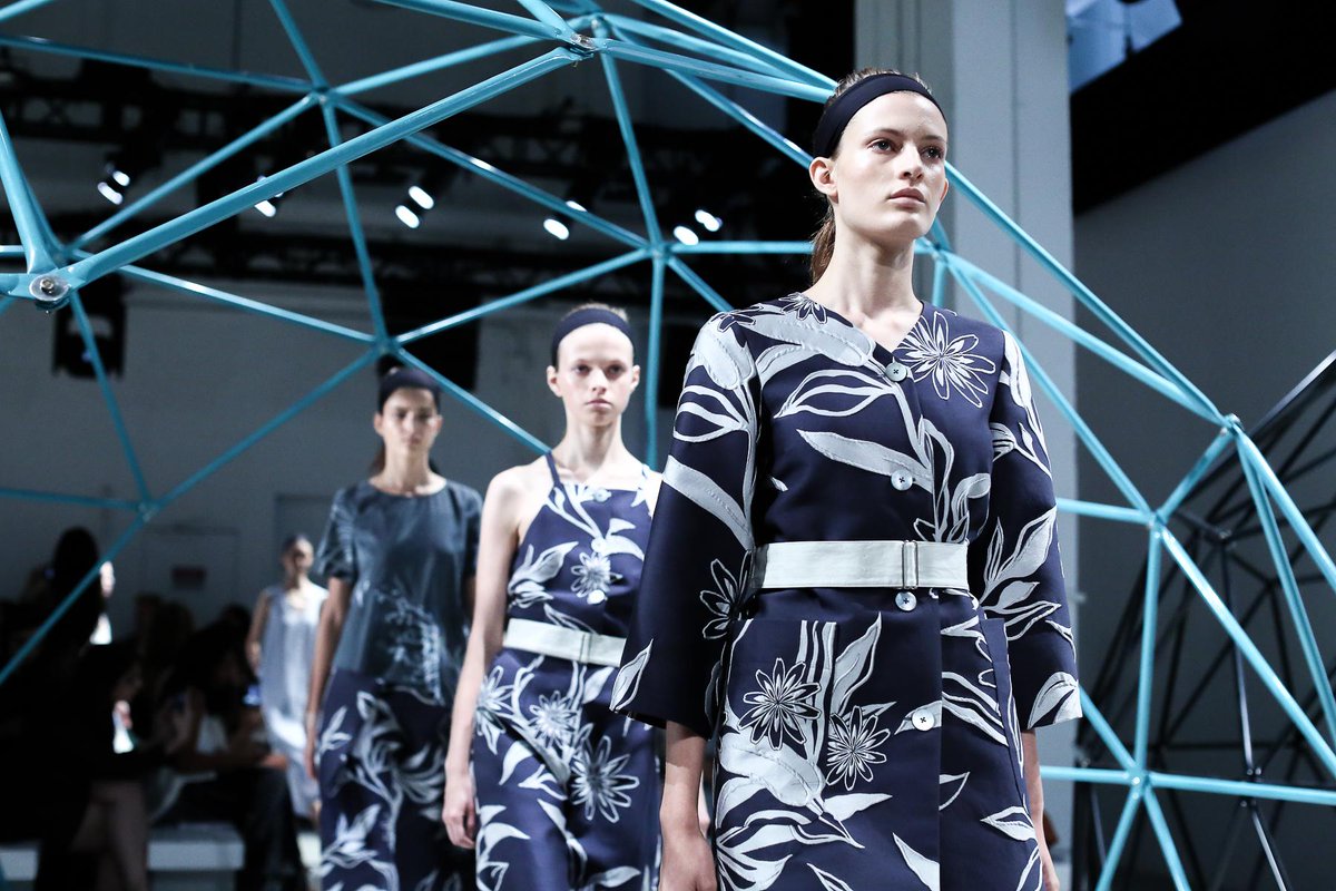 nyfw's tweet photo. On the runway at @suno: Belts and blues. #NYFW http://t.co/JGaHVli9PE