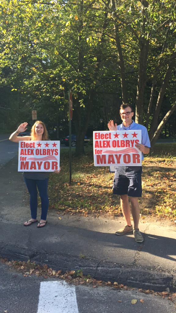 alexolbrys's tweet photo. Out sign waving bright and early! I hope everyone gets out to vote! http://t.co/ozzSUFb1EI