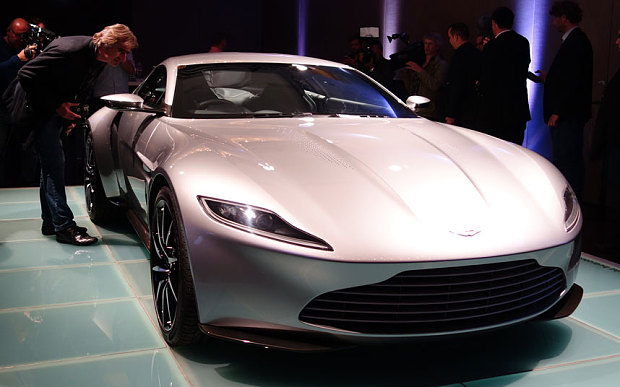 Telegraph's tweet photo. Aston Martin has unveiled James Bond's latest motor, featured in the upcoming Spectre film http://t.co/jYSTiwa6J5 http://t.co/gER2vfsMXD