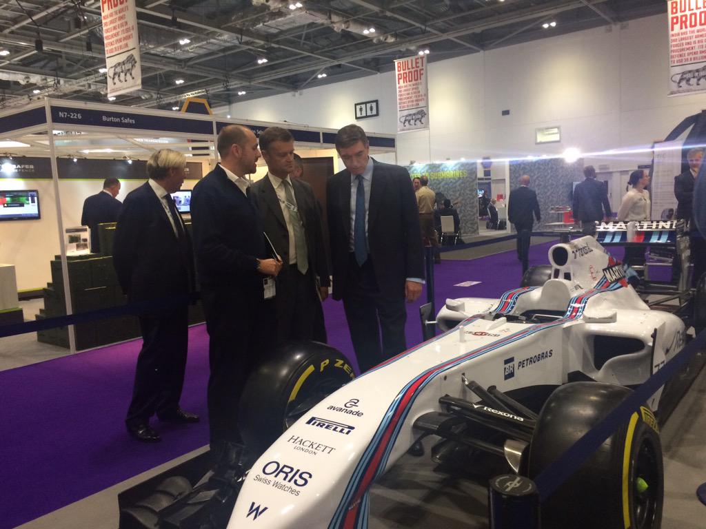 MIAmotorsport's tweet photo. Minister Of Defence Philip Dunne MP visits the #M2Defence stand @DSEI_event @williamsadveng @williamsf1 http://t.co/w6iSjLA670