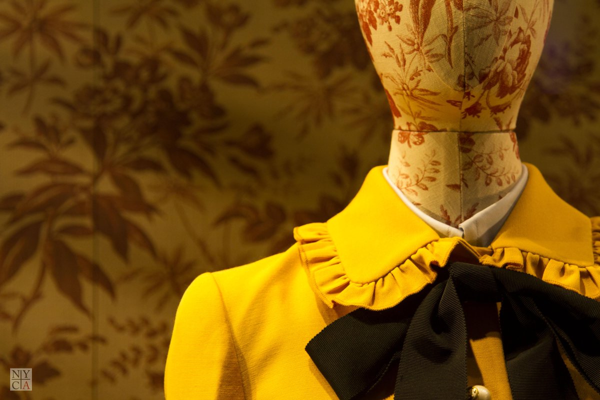 NYCAesthetic's tweet photo. Gucci on 5th Ave has a Victorian feel, high collars, vegetable dye, bows, and William Morris backdrop. #FashionWeek http://t.co/TLAAFSMRES