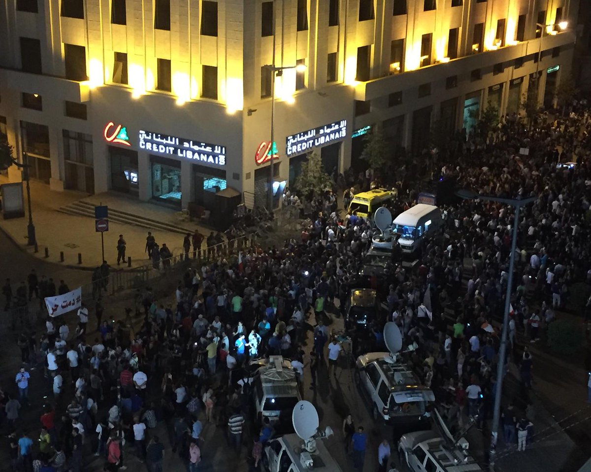 seldeeb's tweet photo. In far left banner "may u stay free" (as hashtag) #beirut #youstink http://t.co/JcMDQuweXo
