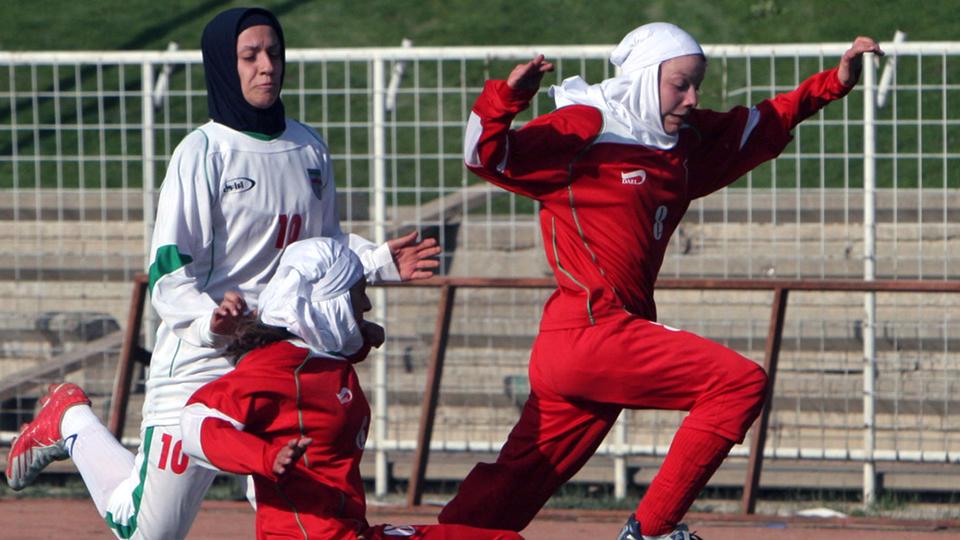 SInow's tweet photo. Iranian women's soccer team captian to miss Asian Cup because her husband took her passport http://t.co/Qz9AgLGh1u http://t.co/rjOIyDkR2o