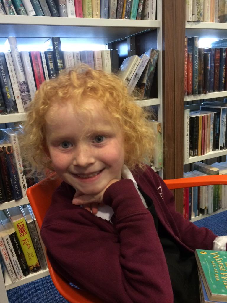 TaraR771's tweet photo. Child reading Worst Witch books @NlandLibs waiting to be presented with #Src15 certificate http://t.co/nxNUEnYrzn