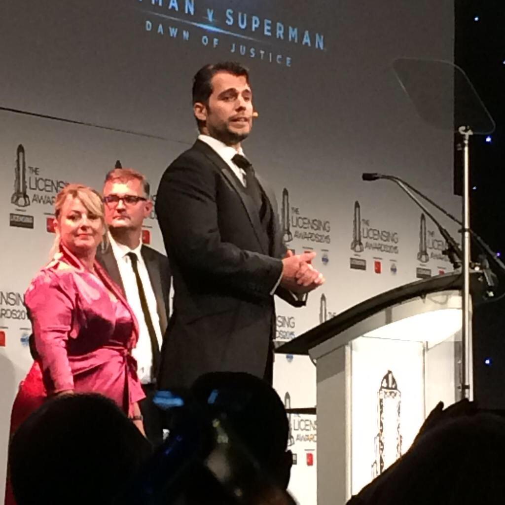 HenryCavillNews's tweet photo. Henry Cavill surprised the crowd at the @LicensingAwards, and we've added a few new pics! http://t.co/5uSkN5KudR http://t.co/cnnahXnn19