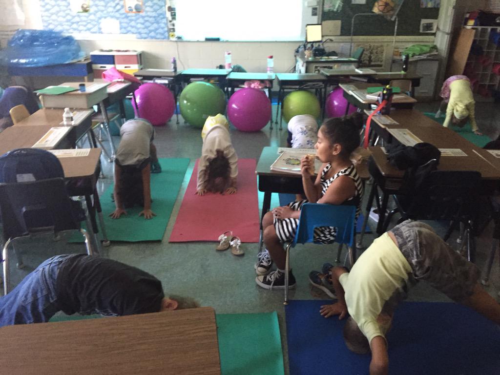 lbikoss's tweet image. Yoga moves and sunflower studies.  Can't get much better than that