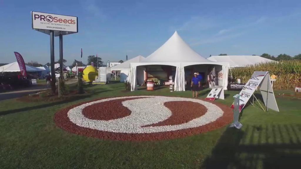 Sevita_Int's tweet photo. Thx again @ontdroneservice for another fun drive-by (fly-by?!) pic of @Sevita_PROSeeds tent @outdoorfarmshow #cofs15 http://t.co/X2et8Axjfw