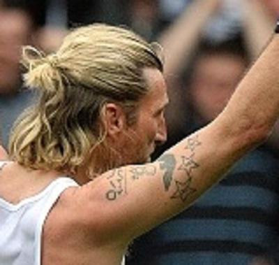 Resultado de imagen de robbie savage tattoo