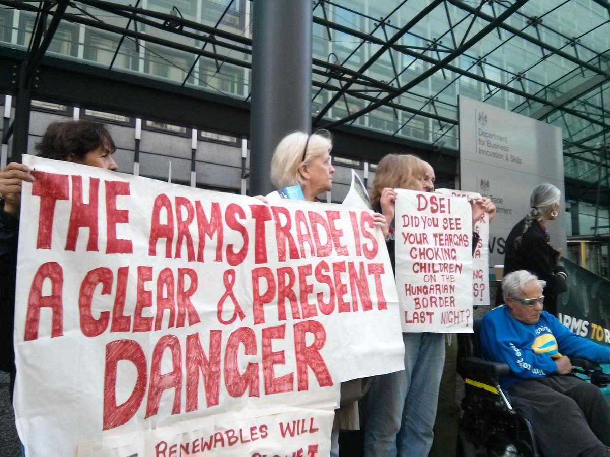 Demonstrators against arms trade fair in London, England