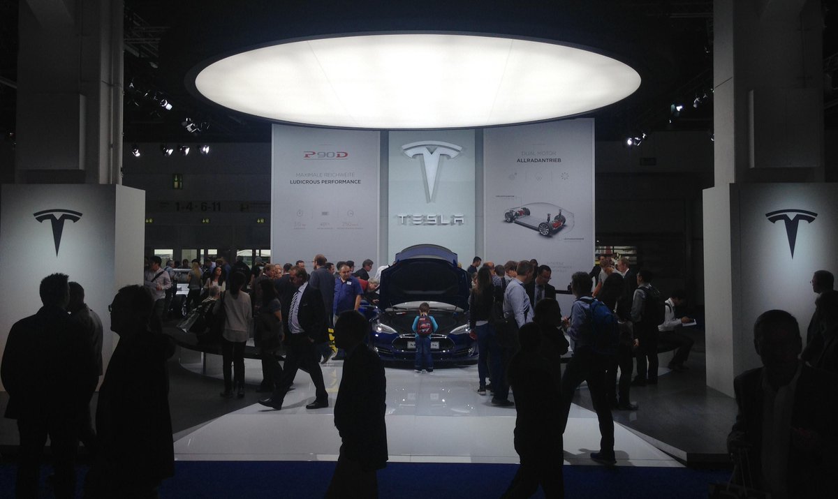Tesla's tweet photo. This little car guy looks into his future @iaamesse #IAA2015 http://t.co/gEUuY4wfwO