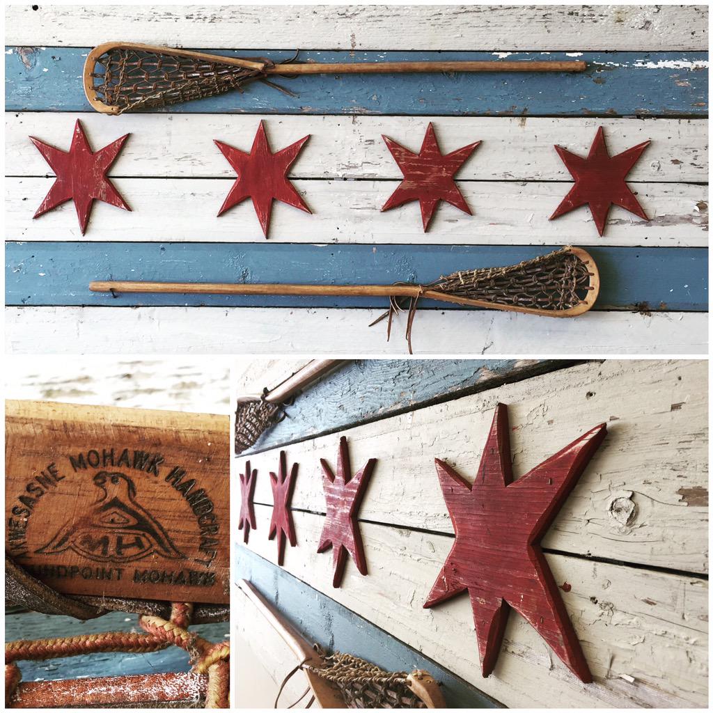 TamaLacrosse's tweet photo. #TBT Vintage Twin #Akwesasne #RoundPoint box sticks mounted on a #barnwood Chicago Flag http://t.co/S34AfOGS6D