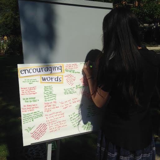 Students read personal stories attached to each of the 1,100 backpacks, and left words to support #suicideprevention.