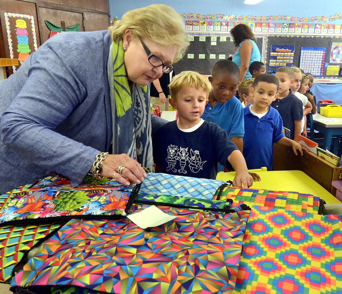nrokos4's tweet photo. #njsenatordianeallen helps kindergarten students select sackpacks in #eliasboudinotschool in #burlingtoncity. http://t.co/XvxF0Zujn6