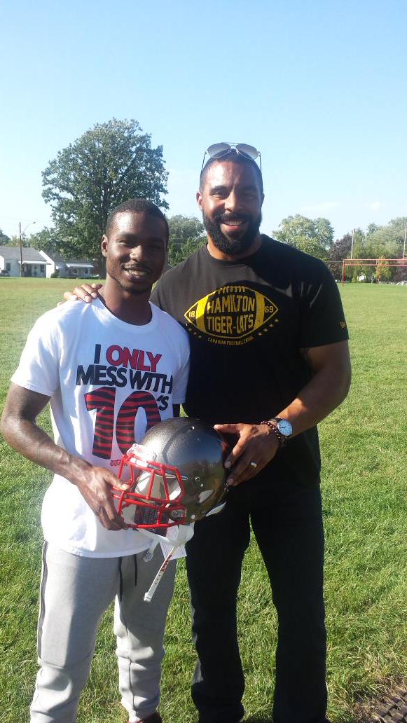 leecorbe's tweet photo. We were honoured to help @ticats donate new helmets to Churchill Football team today. #safetyfirst #charity  #ticats http://t.co/i32Vfteu5b