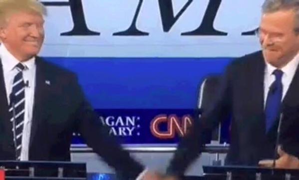 AduItHumour's tweet photo. Jeb Bush high fiving Trump looked like the retarded kid high fiving the high school quarterback. http://t.co/If6wZ6lQzH