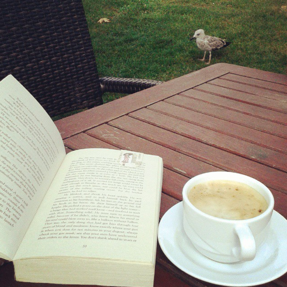 goodreads's tweet photo. "Happiness is a cup of coffee and a good book." #GoodreadswithaView http://t.co/yaJTduvn2U http://t.co/diXGw2P6ND