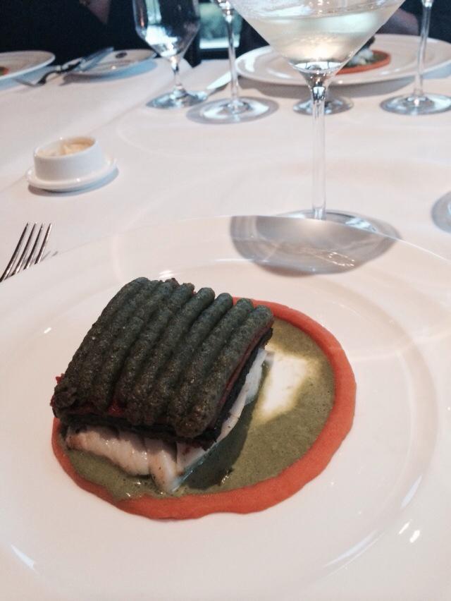 Chilean sea bass with a beautifully layered mushroom, tomato and spinach top at the Bull &amp; Bear, Waldorf Astoria