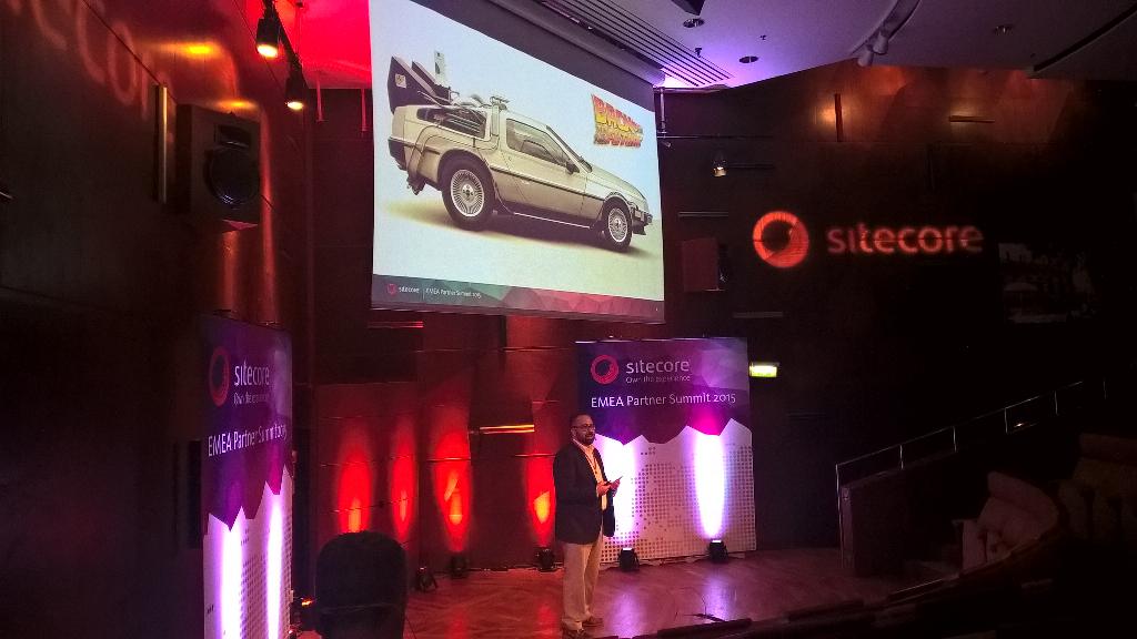 lucbrouwers's tweet photo. DeLorean on stage at #SitecoreEPS...euh sorry Maged Fahmy off course 😊 http://t.co/zHzz73SSSe