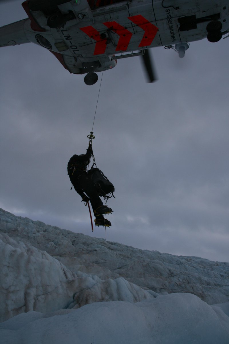 Harvey_Goodwin's tweet photo. Rescue training with #LRKH on Nordenshkiöldbreen. Winching from #SuperPuma onto difficult terrain @Sysselmannen http://t.co/QjF3RJCUlv