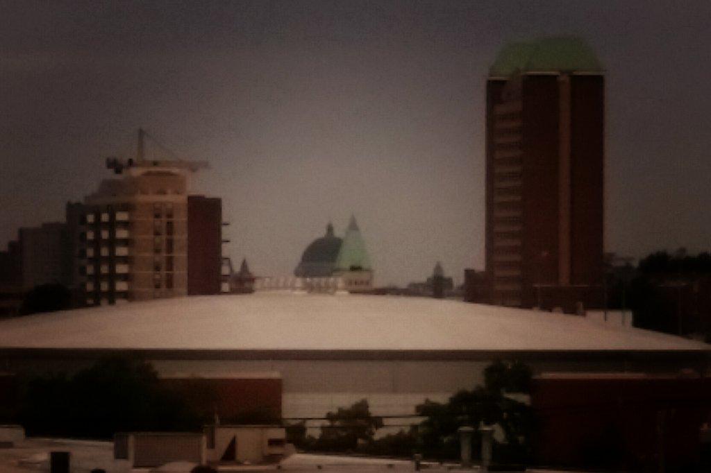 KoppermansSTL's tweet photo. #Clouds over @cathedralstl, but so far still a wonderful morning on the #patio. Come enjoy #breakfast or #lunch! #CWE http://t.co/izRvkm800t