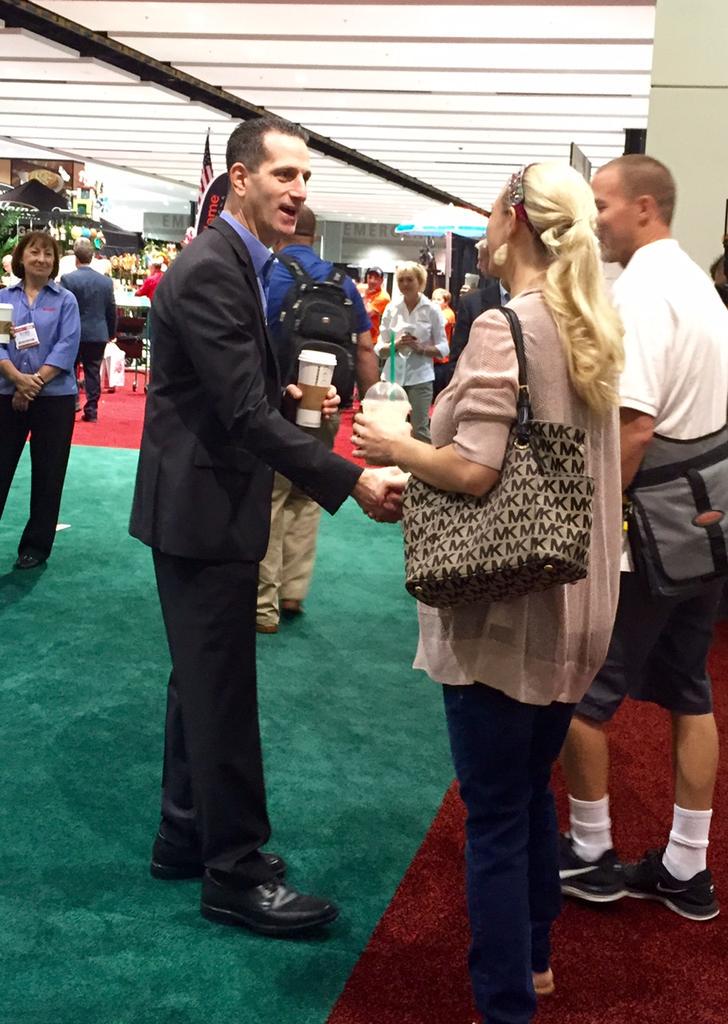 TrueValue's tweet photo. Good morning! Here is CEO John Hartmann greeting guests at #TrueValueReunion #ValueofWow http://t.co/rFRePJhVeO