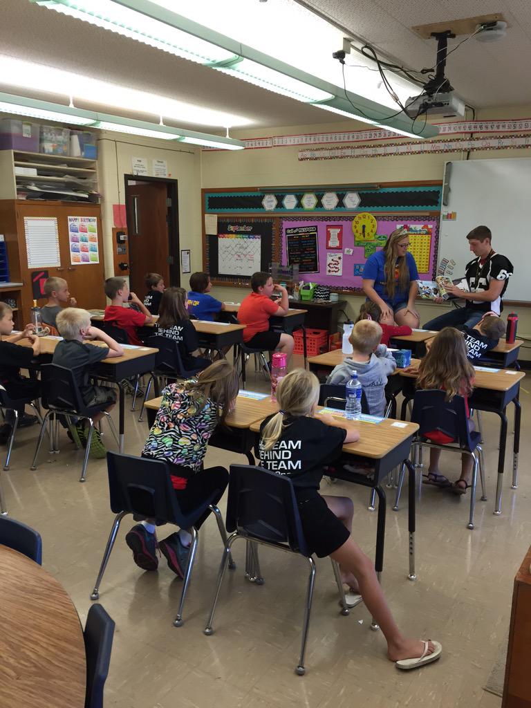 The Homecoming King and Queen, Brody and Elissa, came to read to the second grade classes this morning!!
