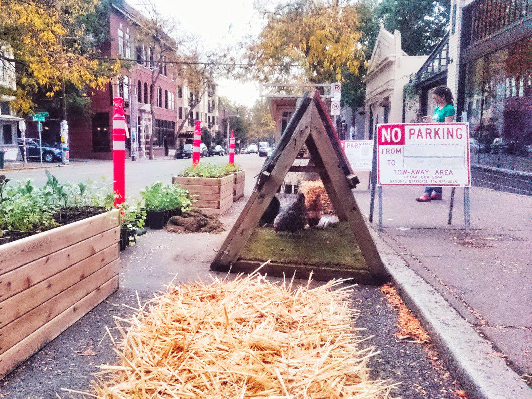 DrawnToCities's tweet photo. .@seattleurbnfarm created this fantastic micro farm with crops &amp; chickens on ballard ave for #SEAParkingDay http://t.co/f03WeFpzCm