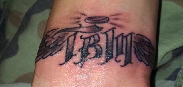 WygalRoxxy's tweet photo. Kevin got his first tattoo and it's @TaylorBrooke36's initials💜👼🏼 we love you Tay.💜 #flyhightay http://t.co/jmEXcStOnq