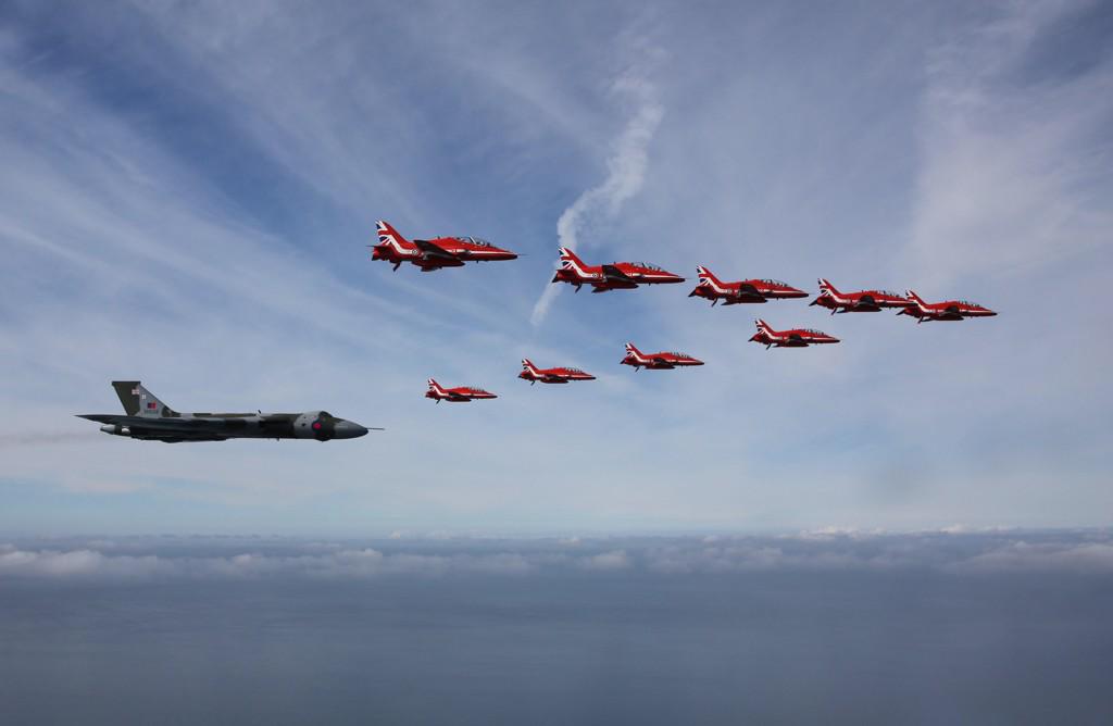 Air-to-air pic of the #Vulcan &amp; Red Arrows' flypast at #southportairshow today. Retweet to say your goodbye to @XH558