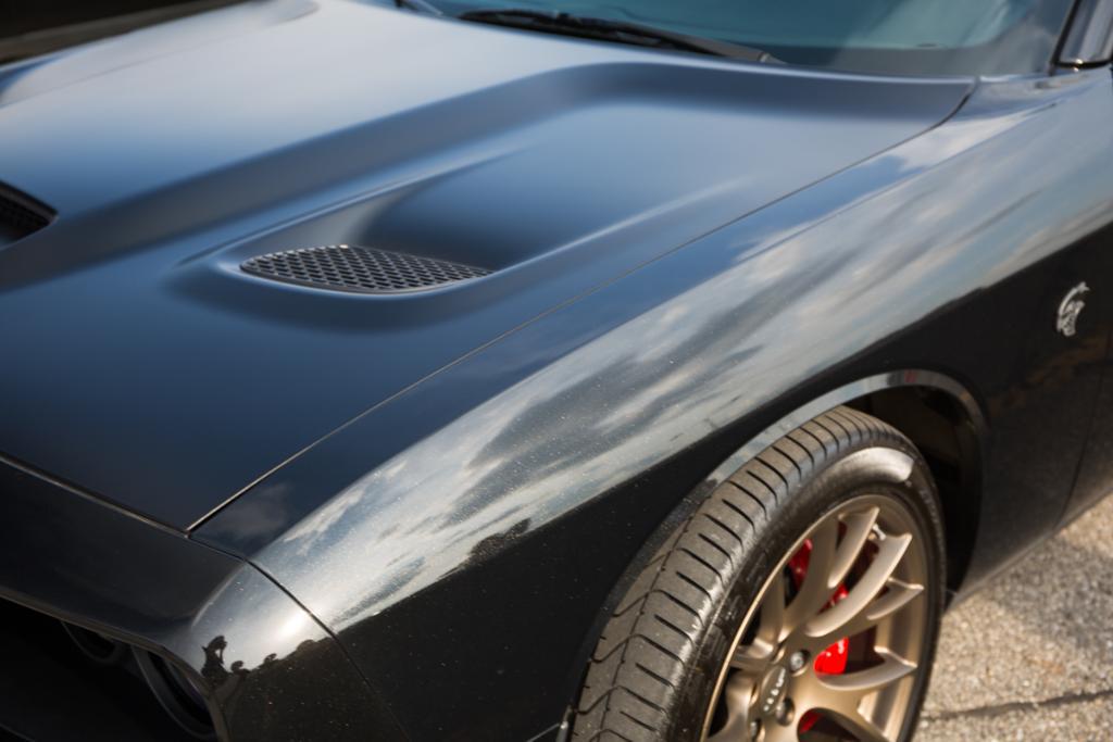Dodge's tweet photo. Don't get too close to this monster. #Challenger #Hellcat http://t.co/KwM37UsKq8