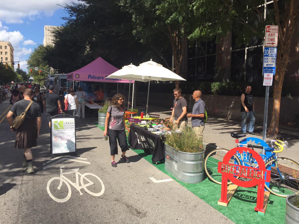 RaleighTranspo's tweet image. Our #bikeraleigh parklet fun continues today at #sparkconX!  Come see us, do a bike rack scavenger hunt for freebies!