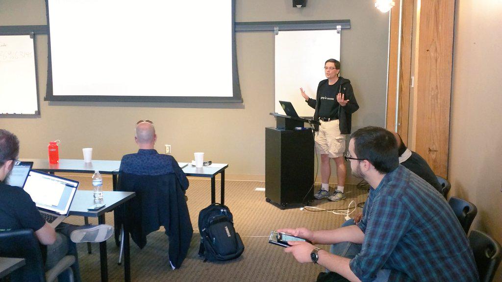 mamund's tweet photo. #EdMoore explaining PowerPoint Karaoke @restfest #5in5 http://t.co/NuhpEK6aW1