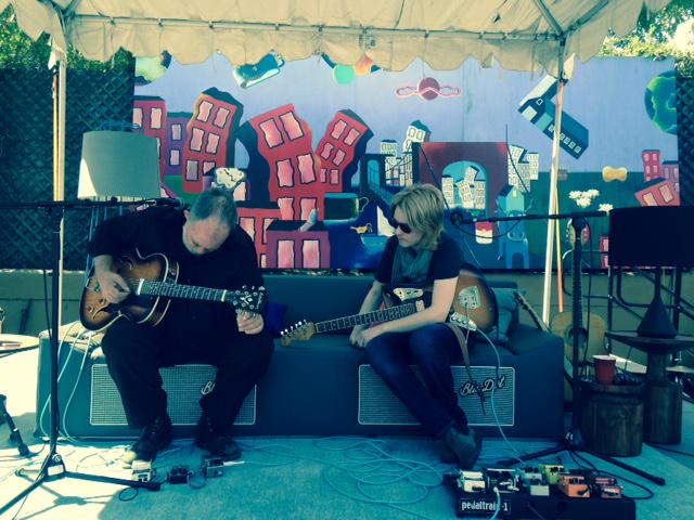 CouchOfRock's tweet photo. Austin legend @JonDeeGraham and his son William http://t.co/d4AP8EtTjA tuning up the couch. #couchofrock #bludot http://t.co/1Adev795Yr