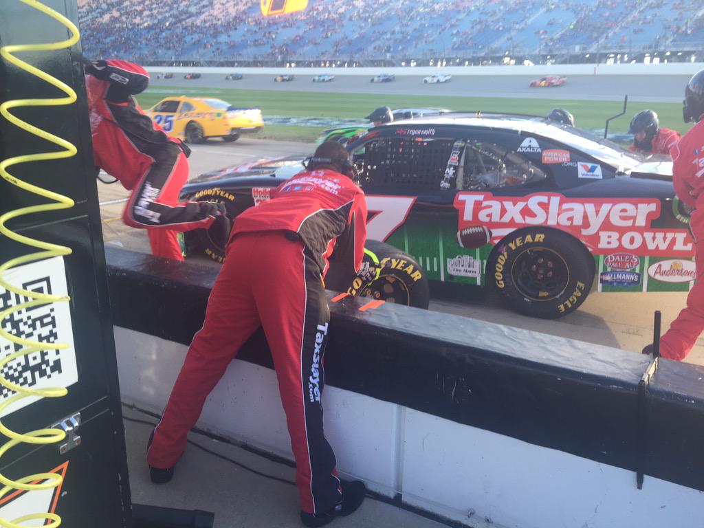 JRMotorsports's tweet photo. Pitting under caution, @ReganSmith gets 4 tires, fuel and an adjustment, gains three spots on pit road. @TaxSlayer http://t.co/fKkGl737zK