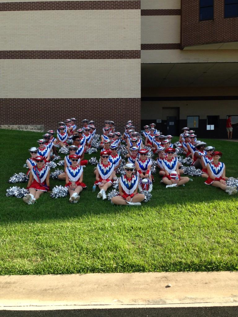 Ahspatriettes's tweet photo. Too hot in the stands? New formation! Gotta love that Texas heat! #keepoffgrass #wemoved #oops http://t.co/fAgI6WLpdI