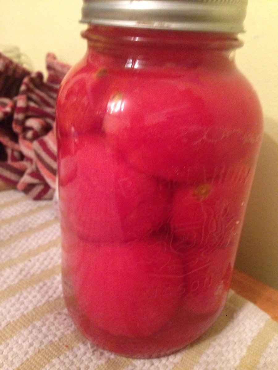 emciel's tweet photo. One of the 10 jars of canned whole tomatoes that made up our final batches today.
#canningweekend day one total: 17L! http://t.co/kkwVarJMLA