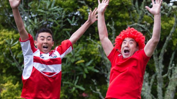 NZStuff's tweet photo. Japanese fans react to massive Rugby World Cup upset over South Africa http://t.co/obsC858wjx http://t.co/DCuGXQWKpo