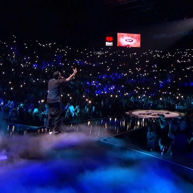Hot983's tweet photo. .@iamdiddy lighting up the arena with a beautiful tribute to lost loved ones! #iHeartRadio ❤️ http://t.co/AaPBdLsBpo