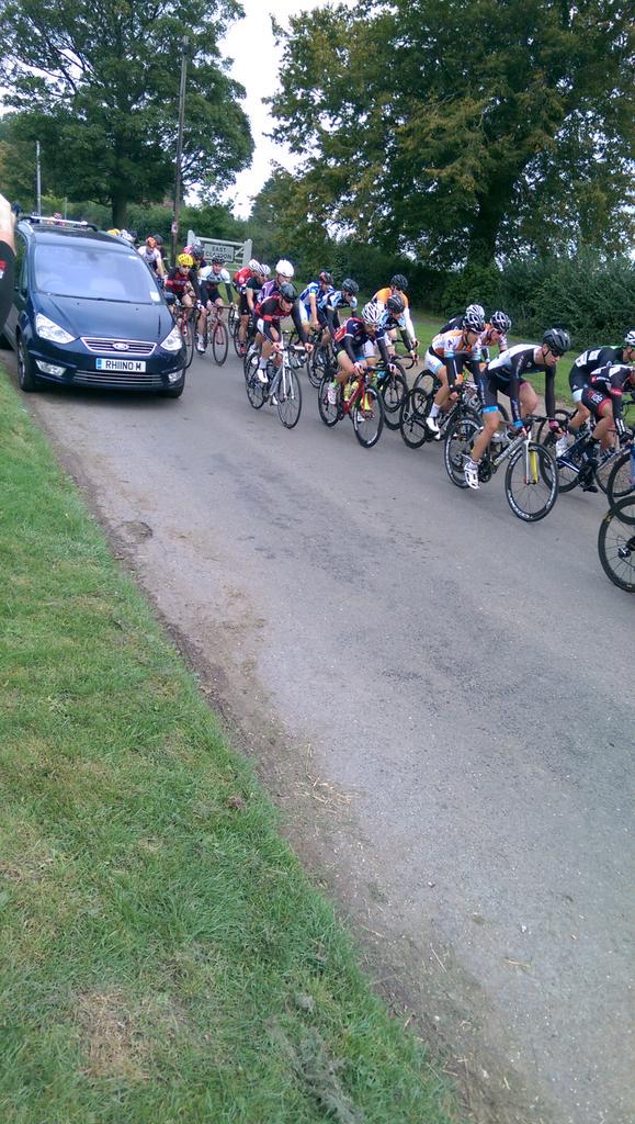 BeestonRacing's tweet photo. #TeamMK race #lap4 @LukeBonnett  showing his race face in the peleton. There is a breakaway of 4, with about 50sec http://t.co/BbHRfdozOG