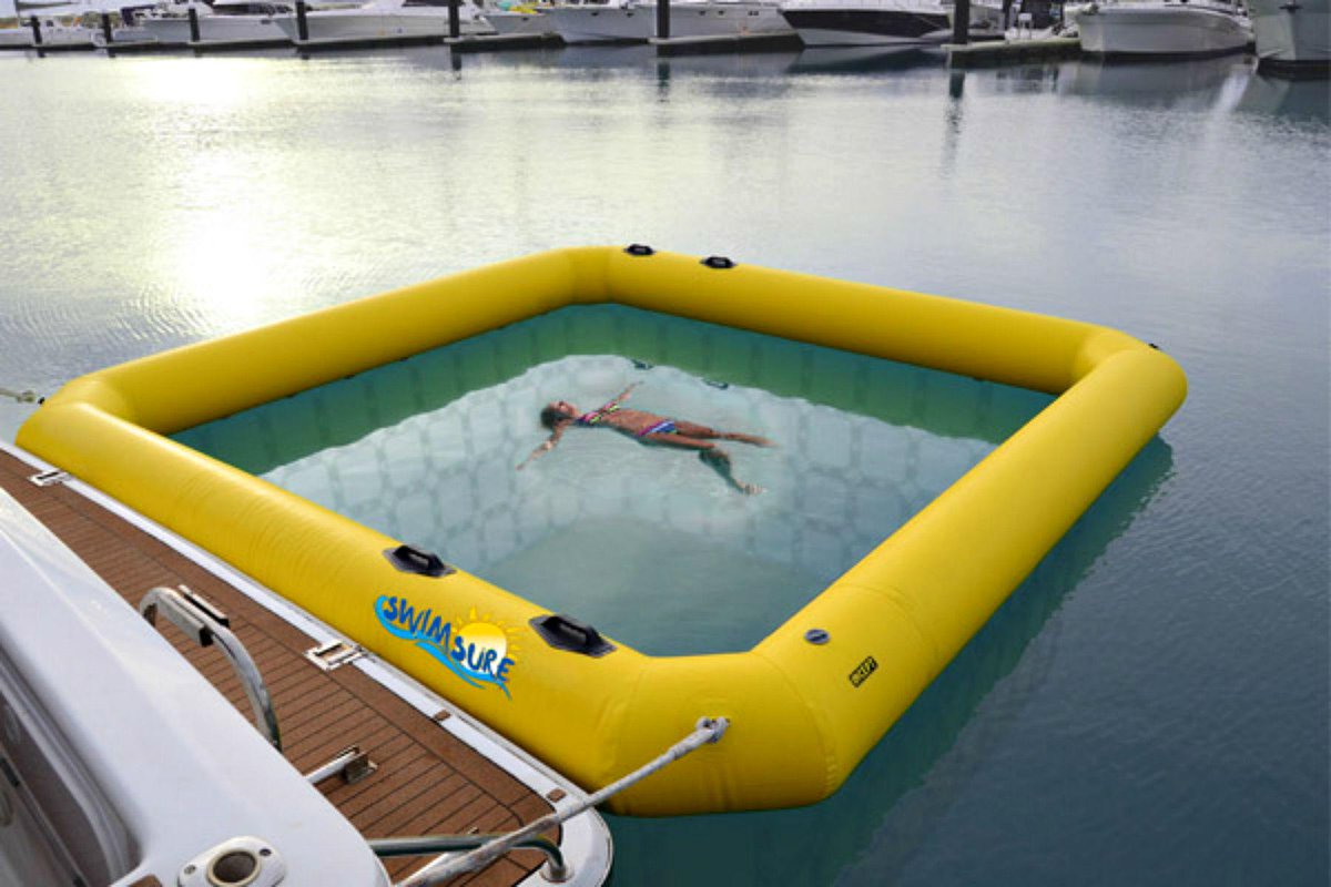 BoatAdvice's tweet photo. One way to beat the growing shark problem, an enclosed swimming pool you tie off the back of the boat #Swimsure http://t.co/8NxsQSMG8h