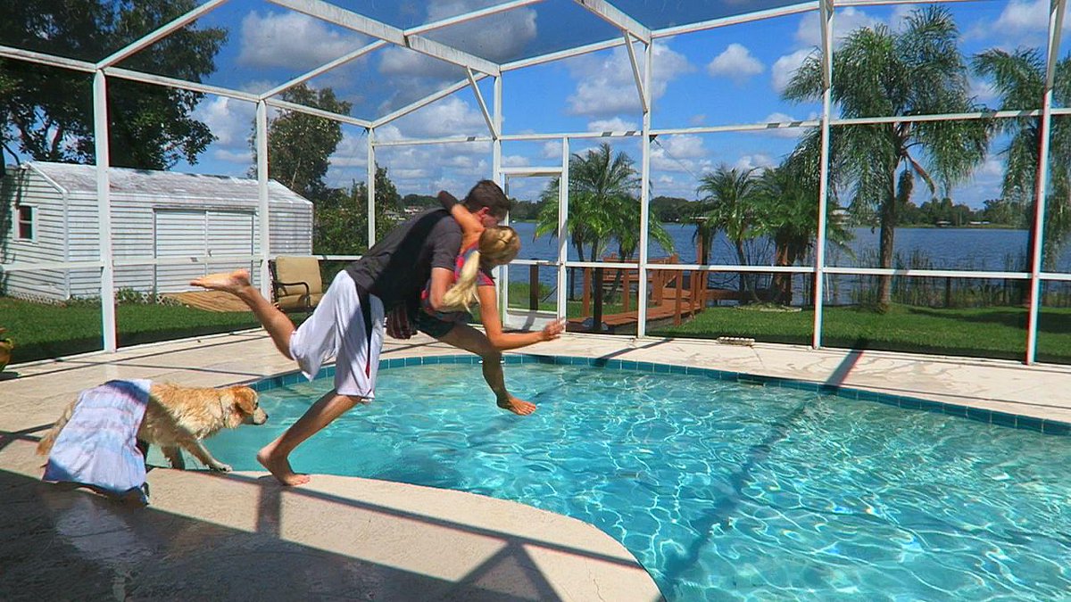 TmarTn's tweet image. She sprayed me with the hose while giving the dogs a bath..... so I threw her in the pool