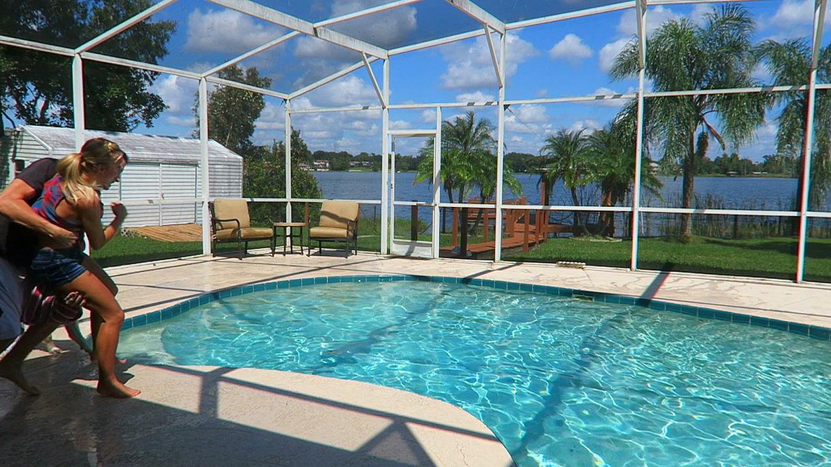 TmarTn's tweet image. She sprayed me with the hose while giving the dogs a bath..... so I threw her in the pool