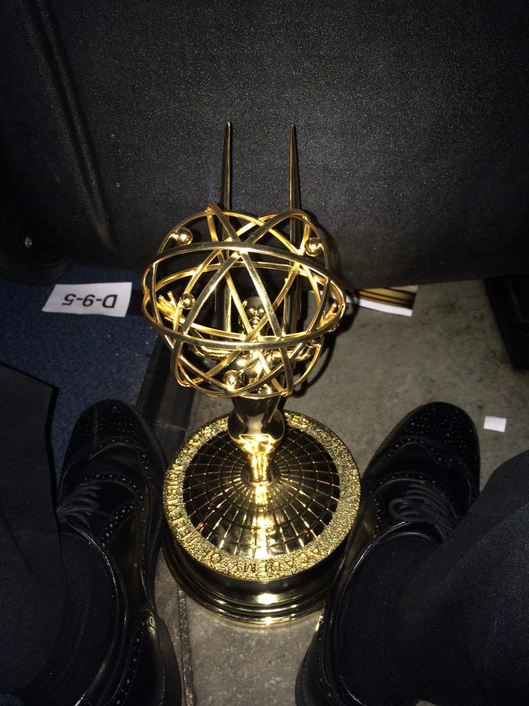 Aiannucci's tweet image. At the Emmys, with an Emmy by my feet.