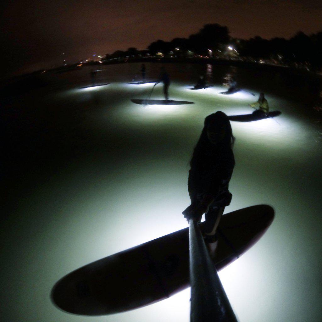 only1phoenixx's tweet photo. No sign of the #SuperBloodMoon but the @supgirlz still had a #SUP-er time! ;-) #nightSUP #OakleyActive http://t.co/g32X5TrMrn