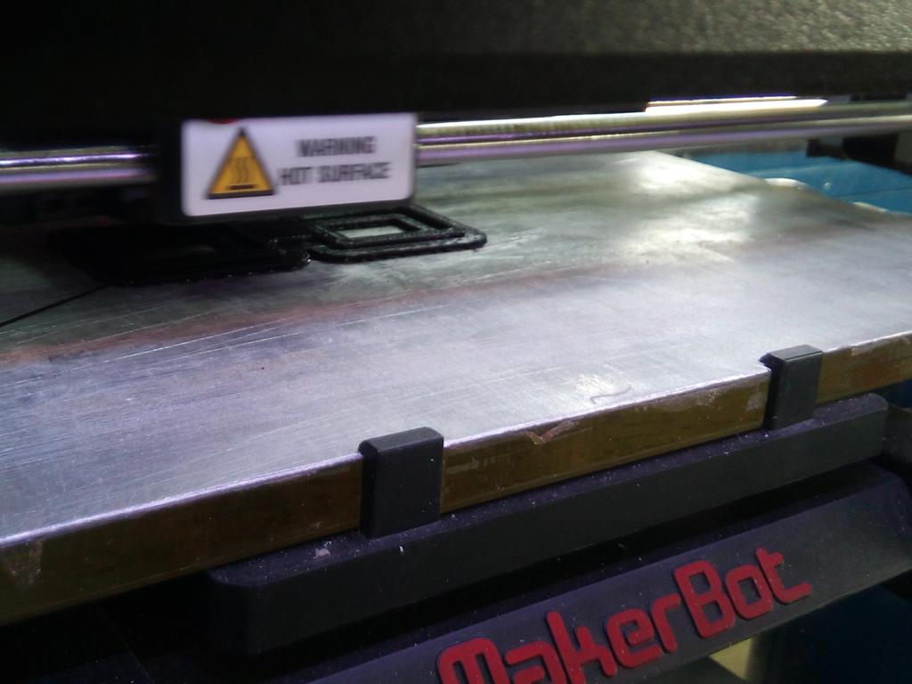 DCol_DT's tweet photo. Year 10 DT students getting to grips with the @makerbot 3D printer manufacturing ear bud clips. http://t.co/OMtH2jbCud