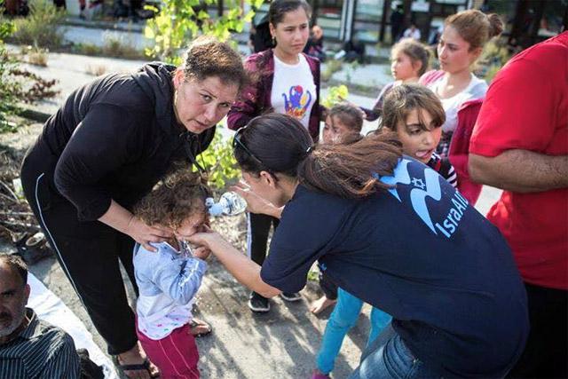 Israel's tweet photo. IsraAid supports efforts in europe to provide immediate humanitarian aid to refugees: http://t.co/hyQD8jFJOU http://t.co/x2XsMEHSCo