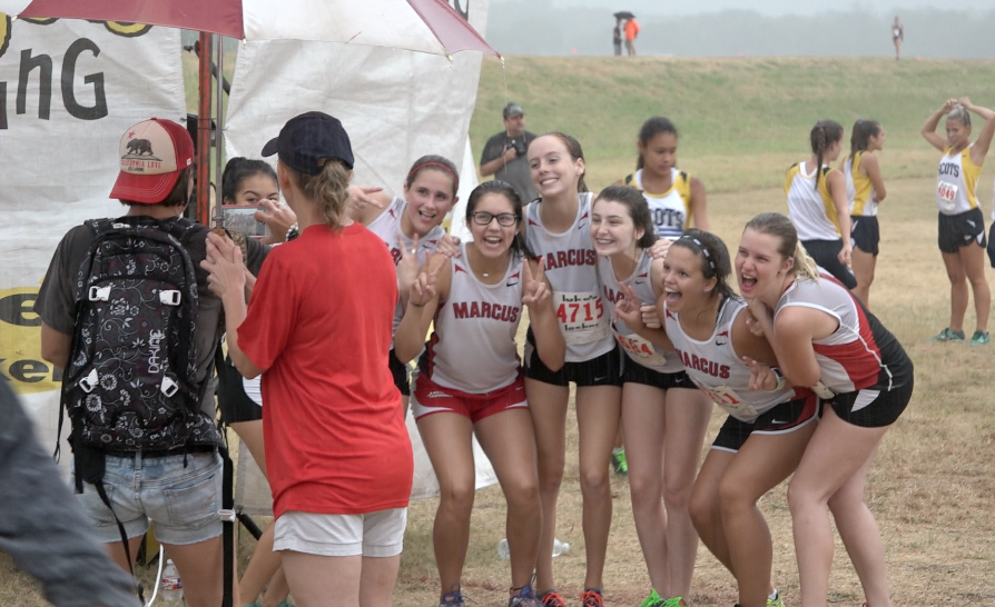 TXMileSplit's tweet photo. When life throws rain at your XC meet, make the most of it! @MarcusXCTrack #Marcus2 @Marcus_HS http://t.co/dKILzZJ6jw