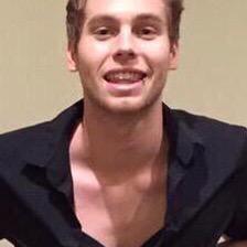 adoreaboutluke's tweet photo. luke wearing this shirt it showed off his collarbones so well, i need to start a petition for him to wear it again http://t.co/SFCJRqlXRy